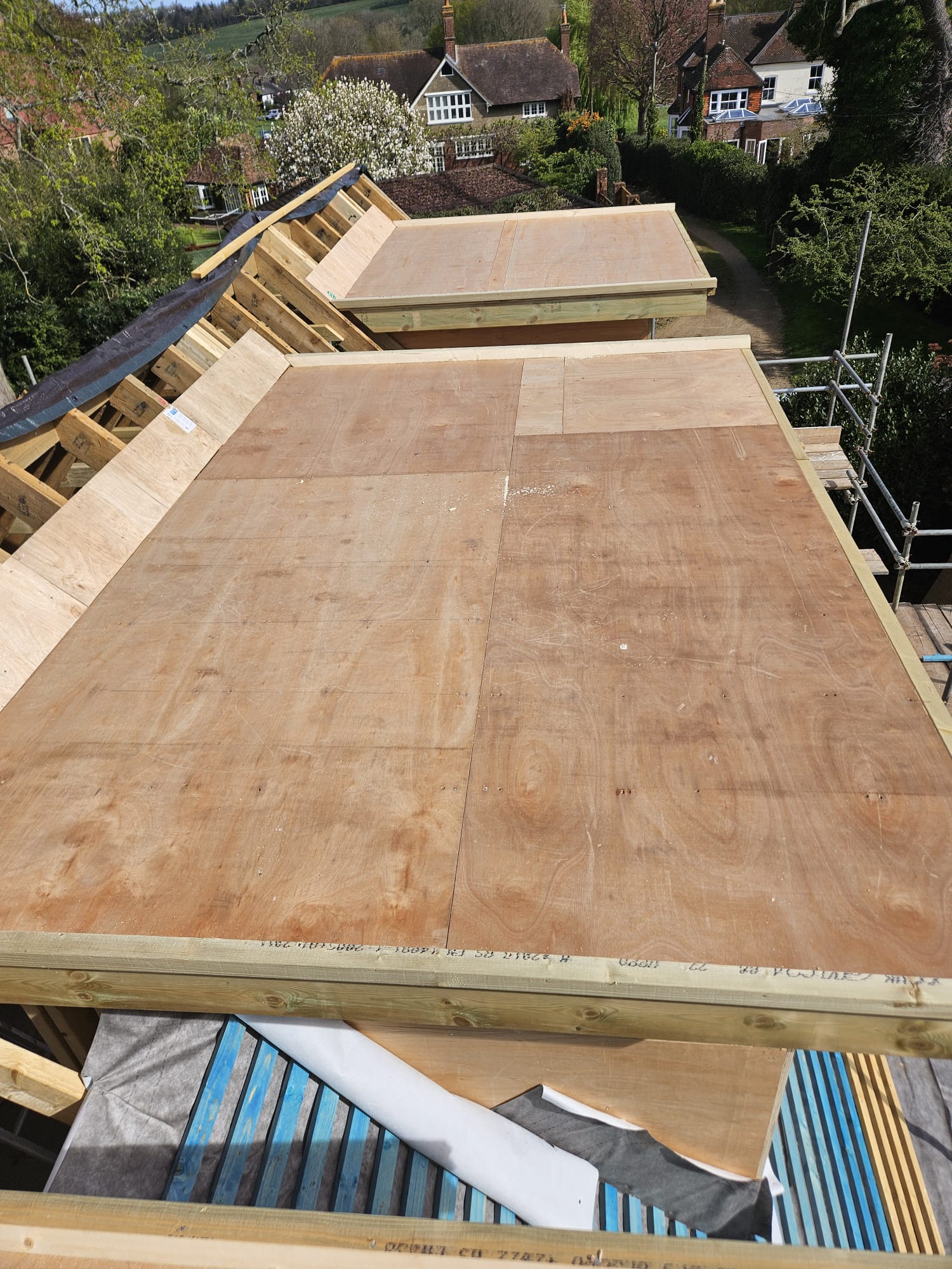 New roof timbers and ply decking completed across a Surrey roof extension
