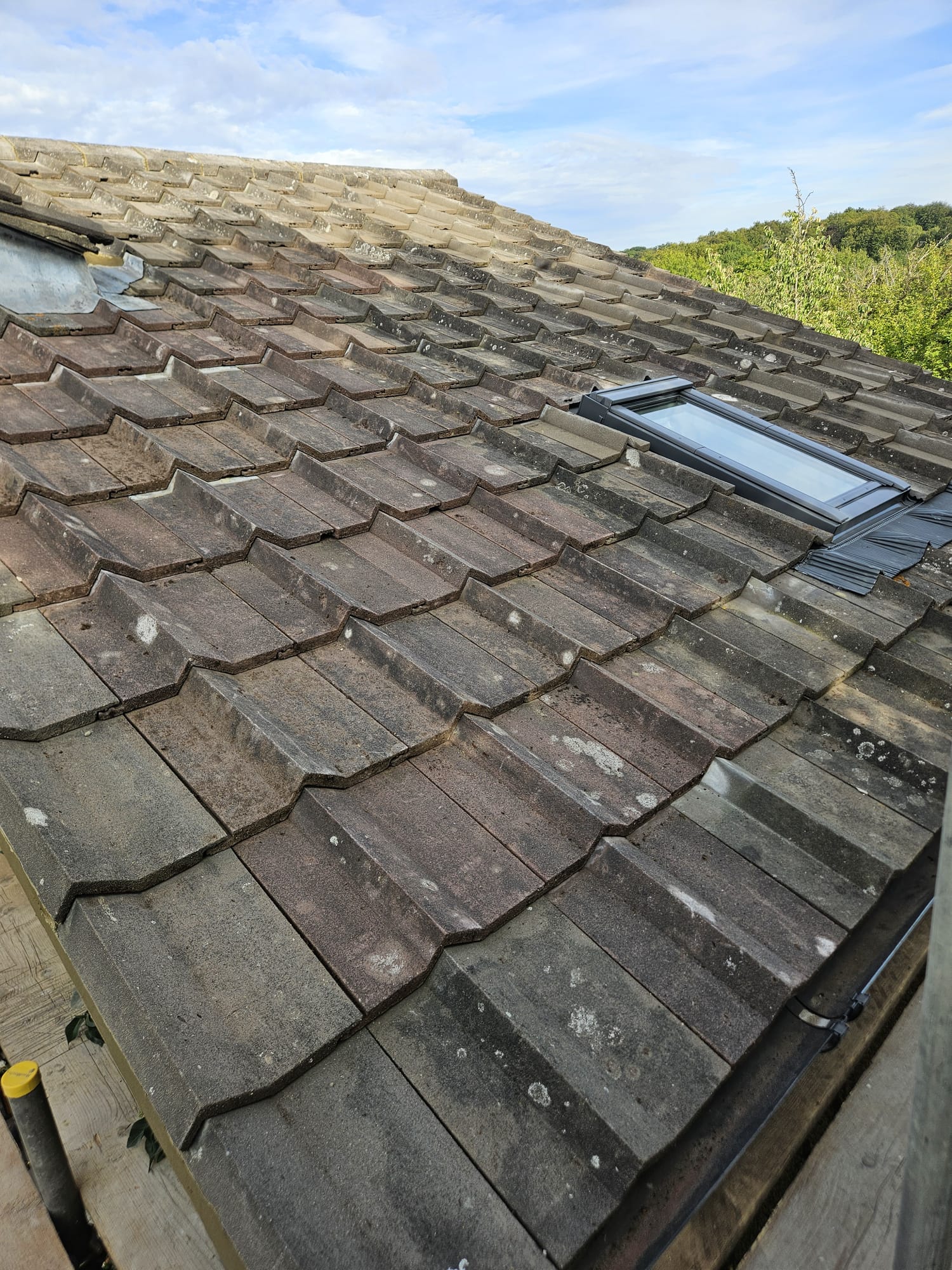 New Velux roof window installed into a tiled roof in Surrey