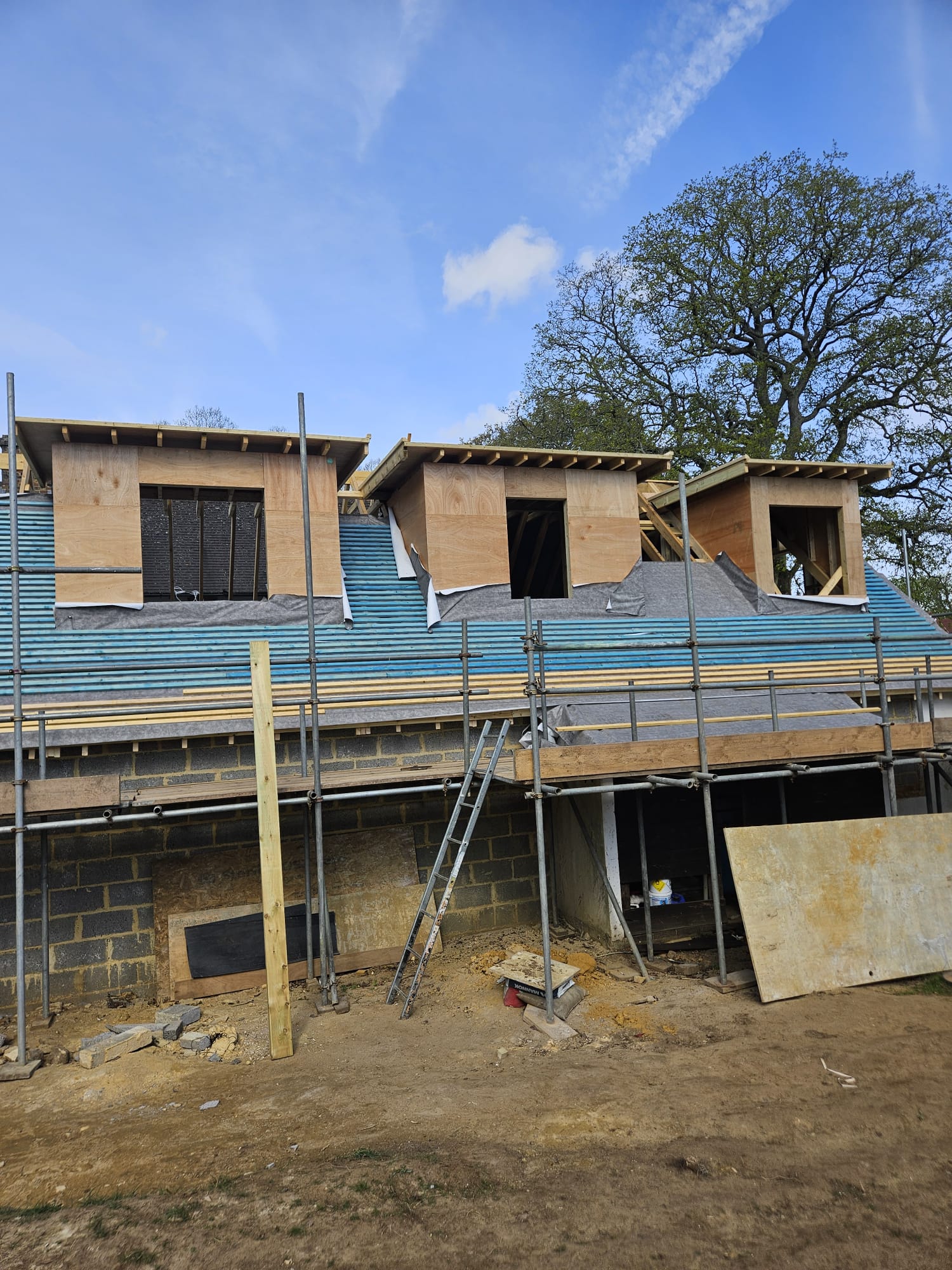 New dormer roof structures and membrane fitted during roof works in Surrey